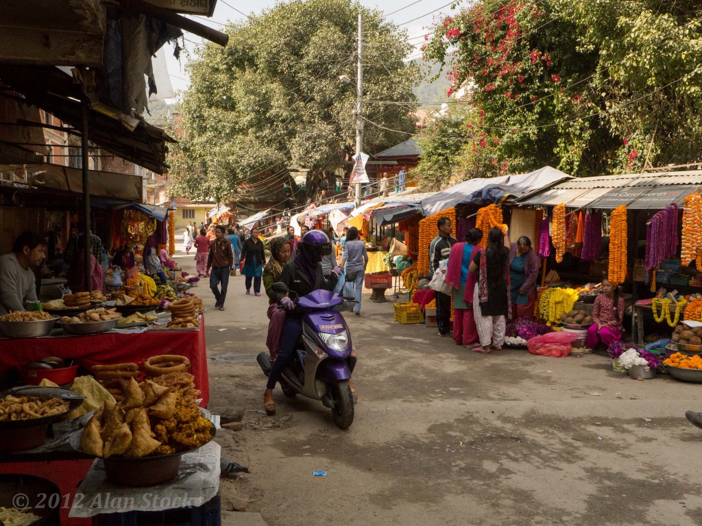 Holy offering stalls outside the temple