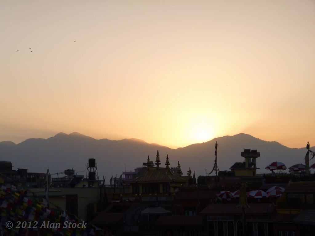 The sun vanishes over a temple-themed hotel